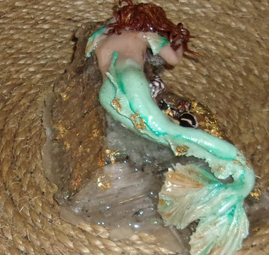 Beautiful Mermaid on the Rock