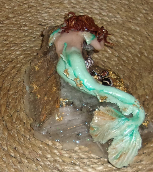 Beautiful Mermaid on the Rock